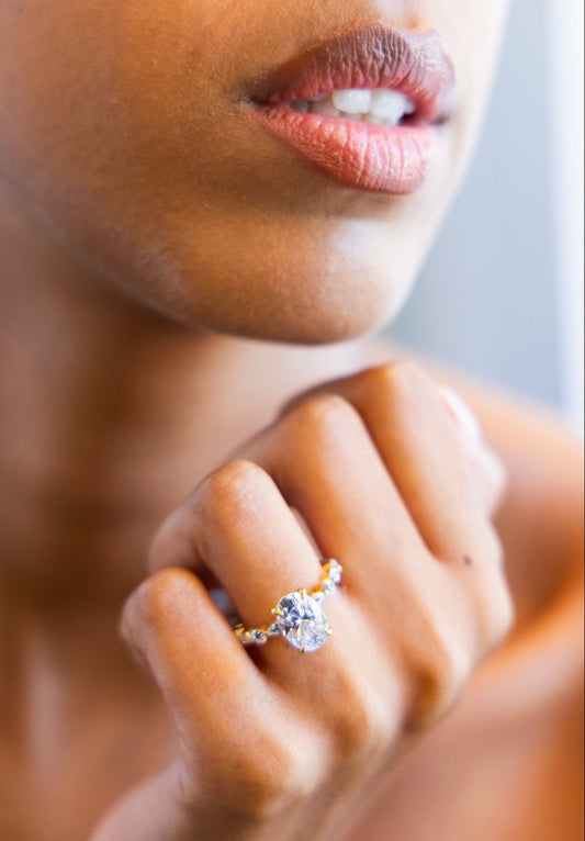 Marquise and Round Single Prong Diamond Engagement Ring with Oval Cut Diamond