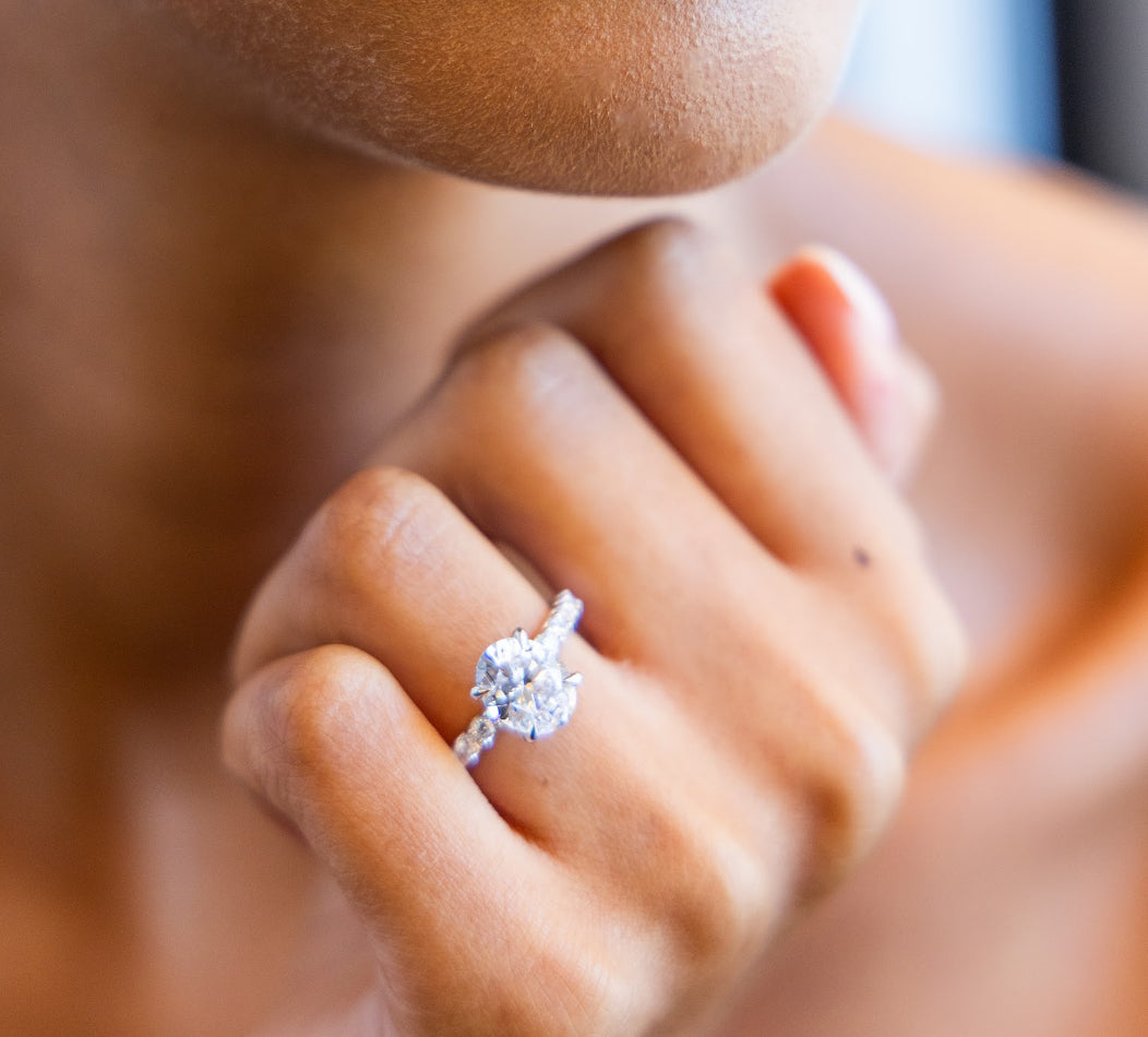 Shared Prong Diamond Engagement Ring with Oval Cut Diamond