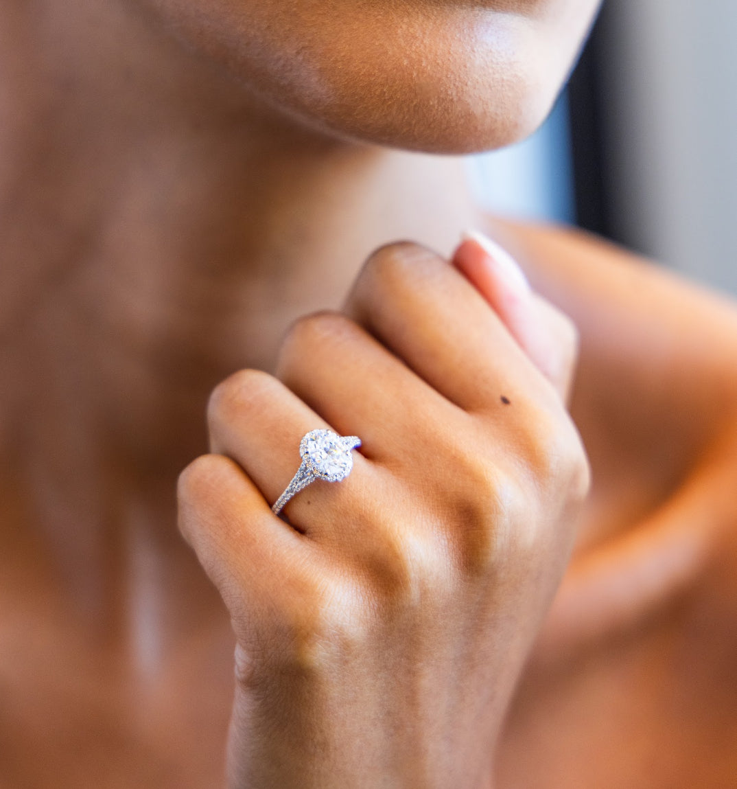 Split Band Diamond Halo Engagement Ring with Oval Cut Diamond