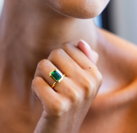 Floating Bezel Set Engagement Ring with Emerald Cut Diamond