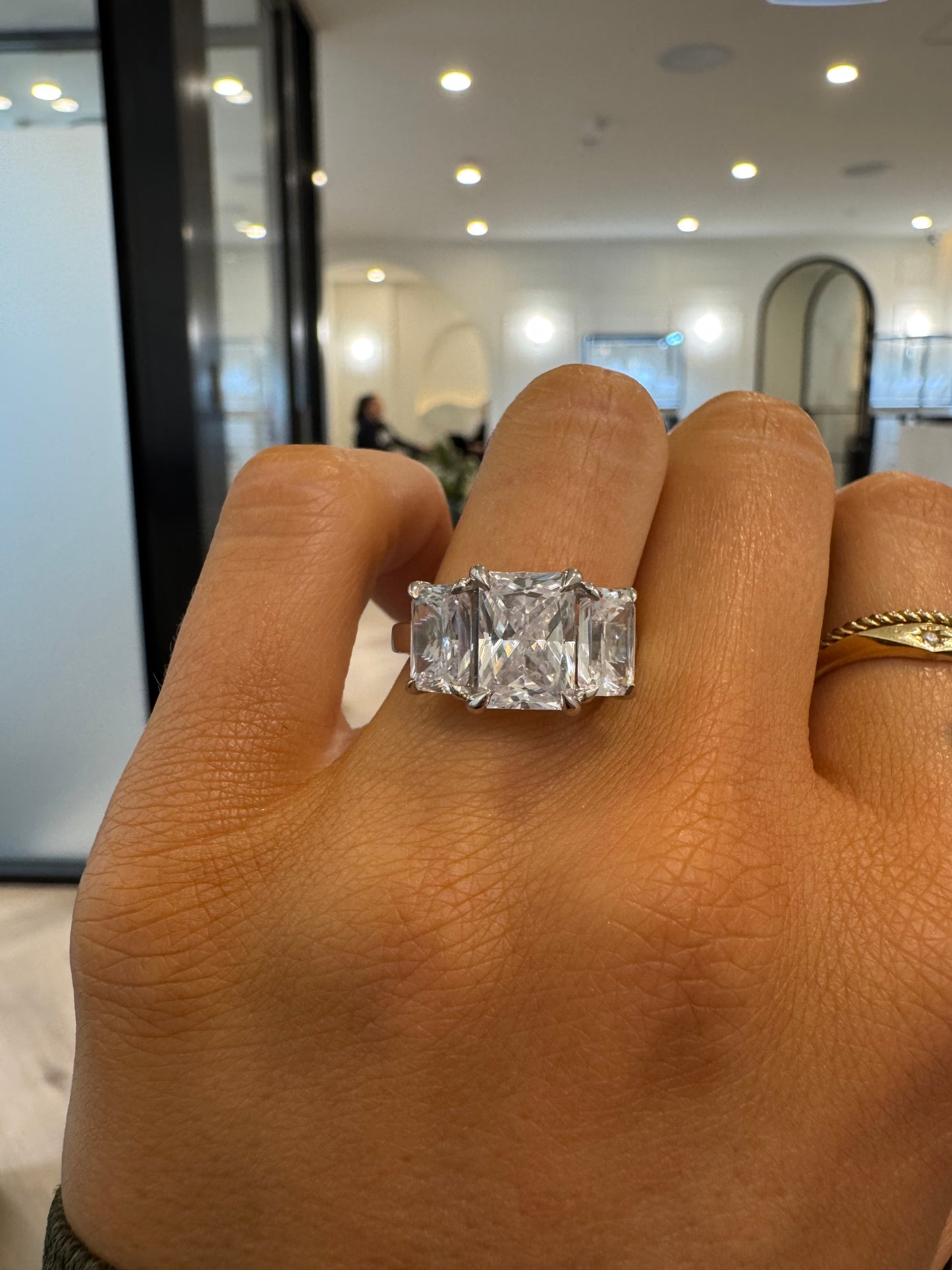 Three Stone Engagement Ring with Radiant Cut Diamonds