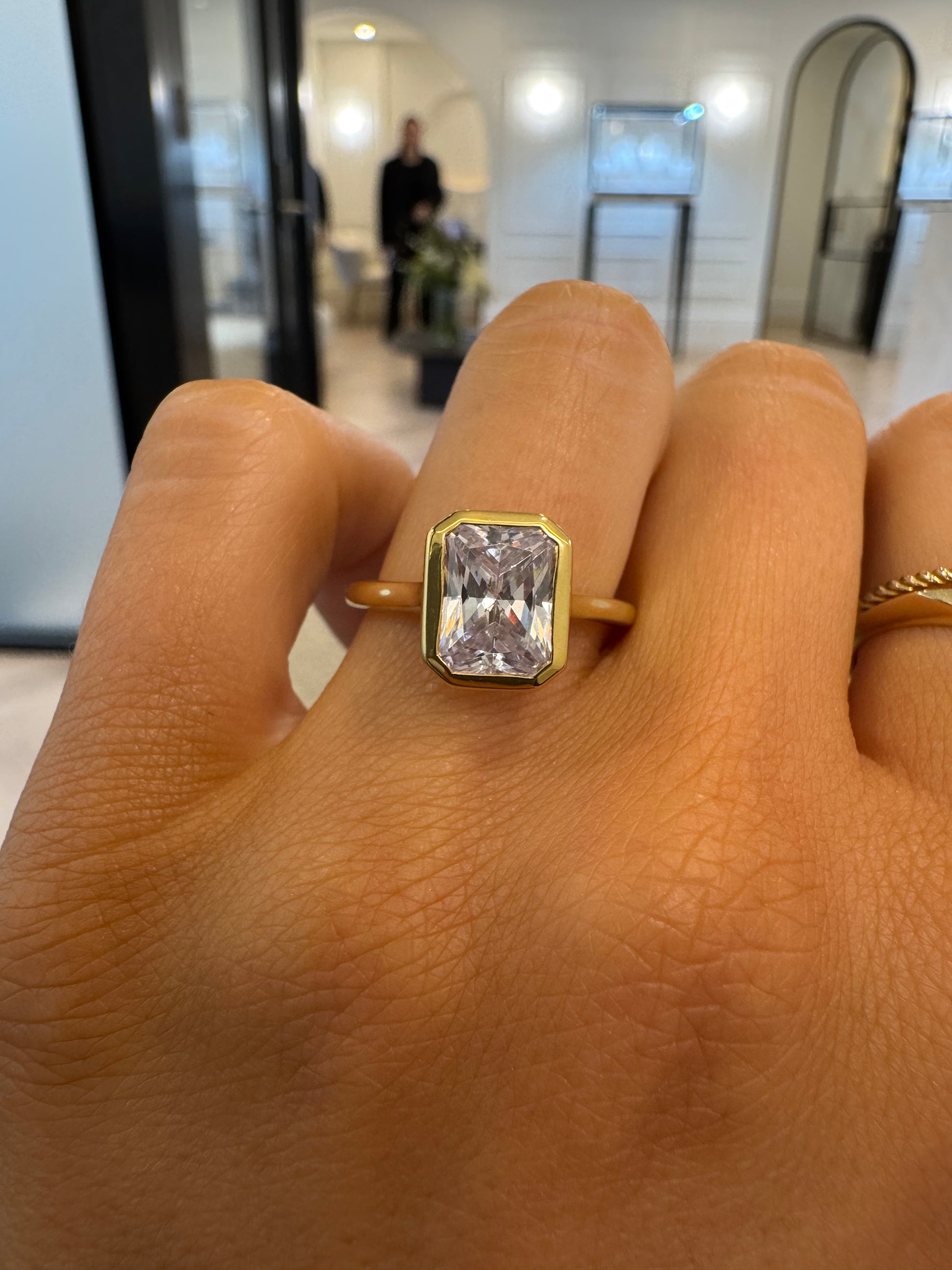 Bezel Set Engagement Ring with Radiant Cut Diamond