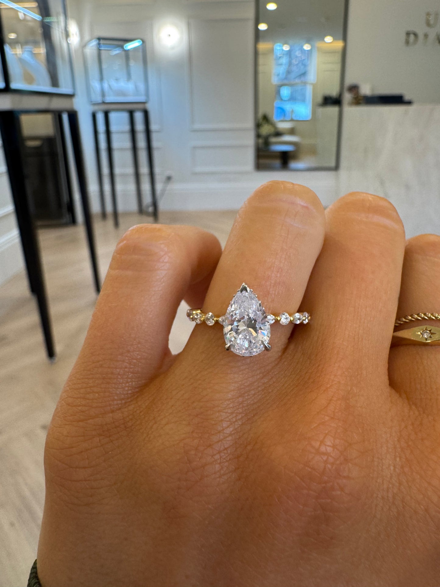 Petite Marquise and Round Single Prong Diamond Engagement Ring with Pear Cut Diamond