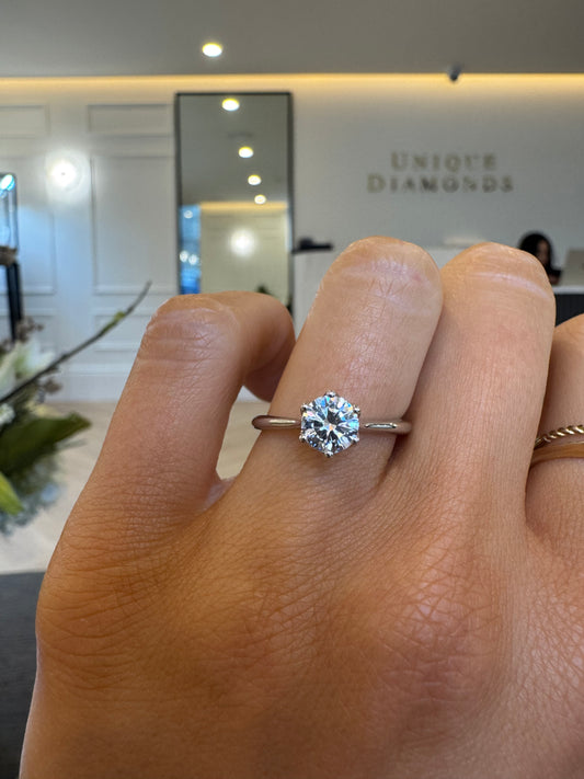 Cathedral Solitaire Engagement Ring with Round Brilliant Cut Diamond