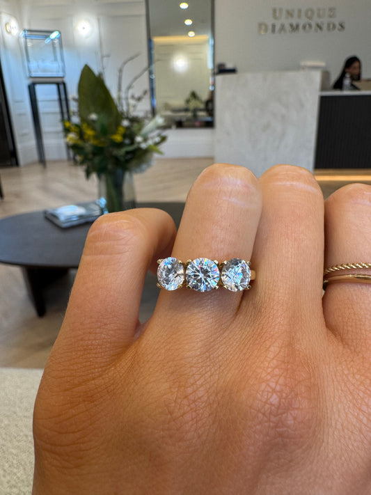 Three Stone Engagement Ring with Round Brilliant Cut Diamonds