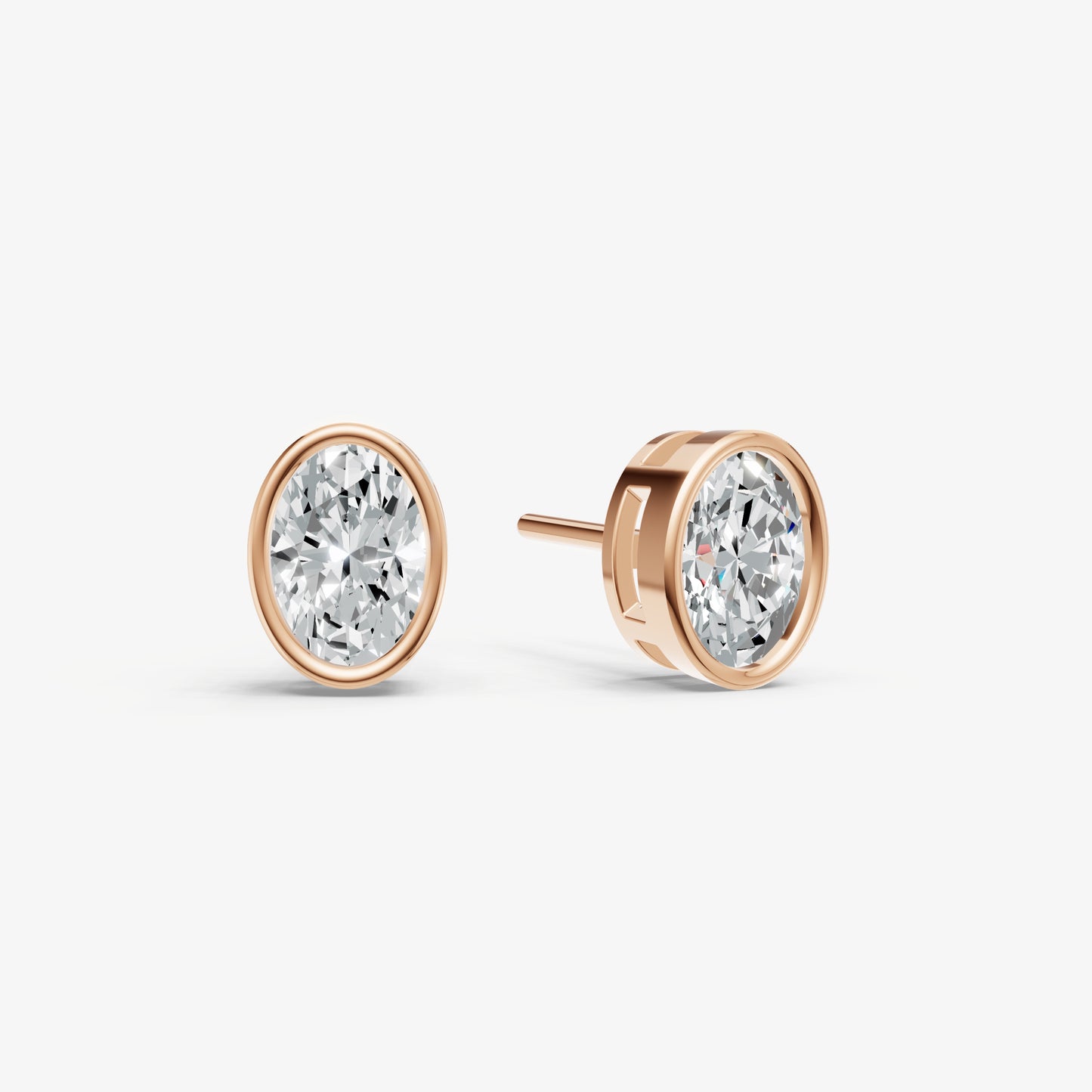 1.00ct Total Diamond Weight Oval Bezel Set Diamond Stud Earrings