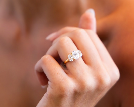 Three Stone Engagement Ring with Oval Cut Diamonds