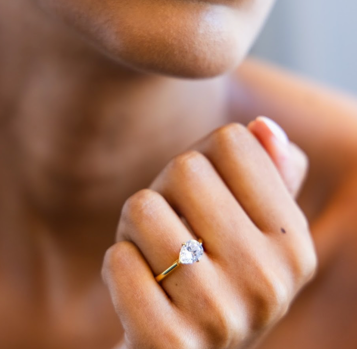 East West Engagement Ring with Pear Cut Diamond