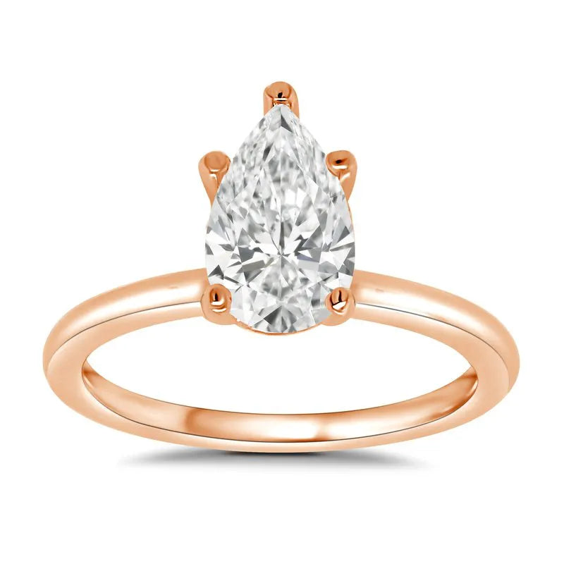 Rose gold pear shaped deals diamond engagement ring