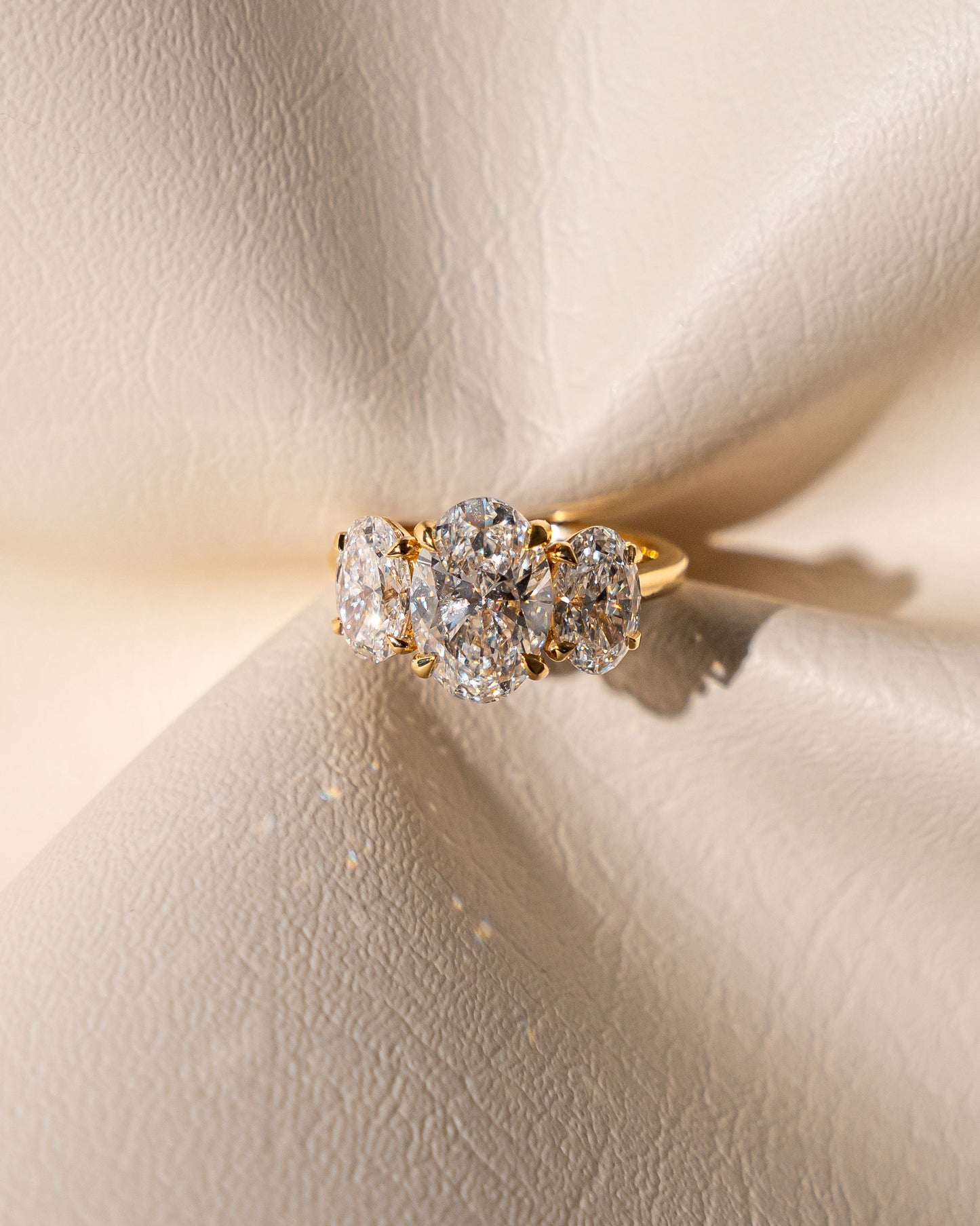Oval Trellis Three-Stone Engagement Ring with 0.80ct Side Stones