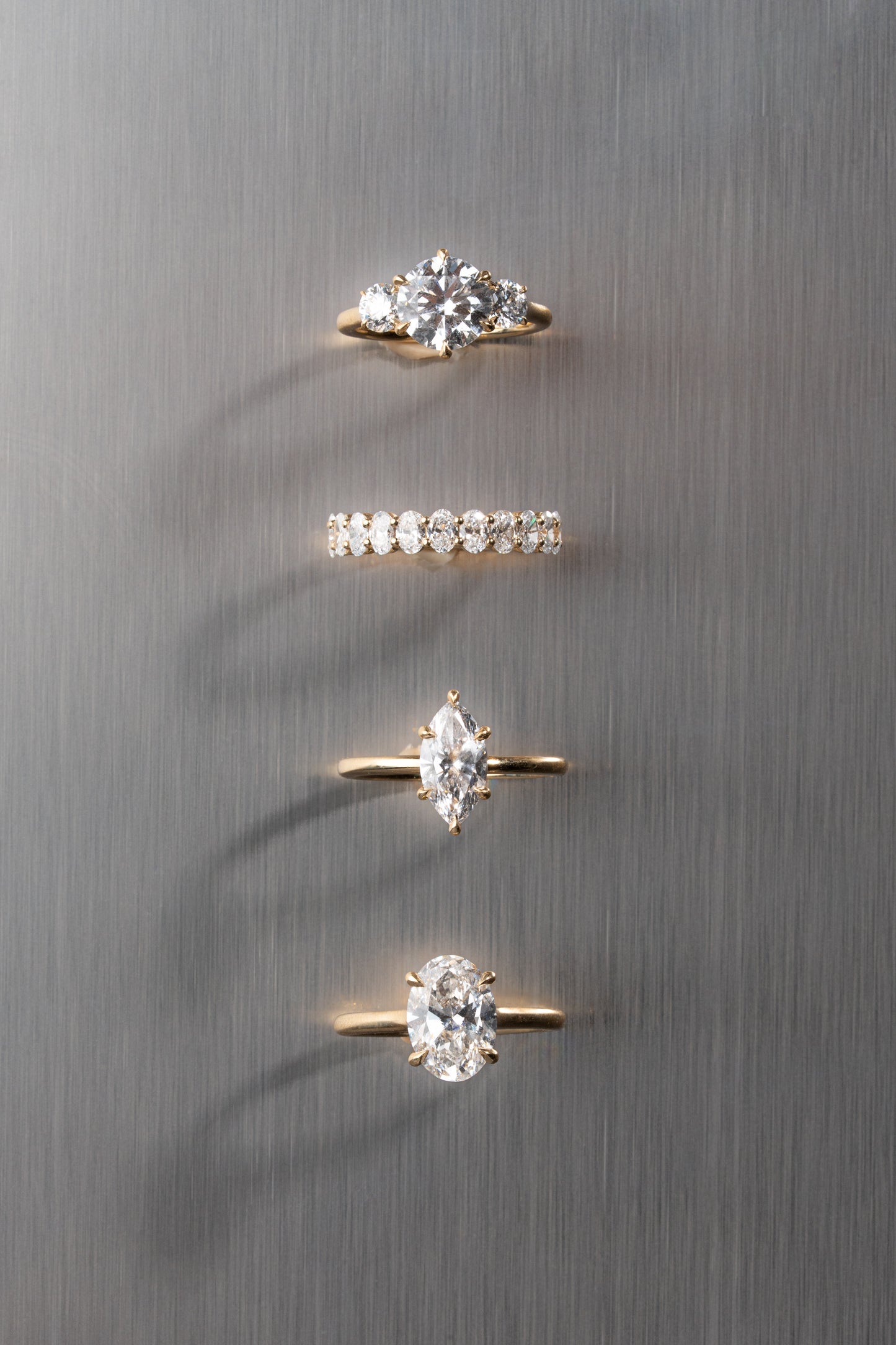 Round Trilogy Diamond Engagement Ring with 0.50ct Side Stones