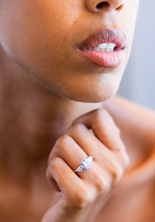 Pear Trilogy Engagement Ring with Oval Cut Diamond