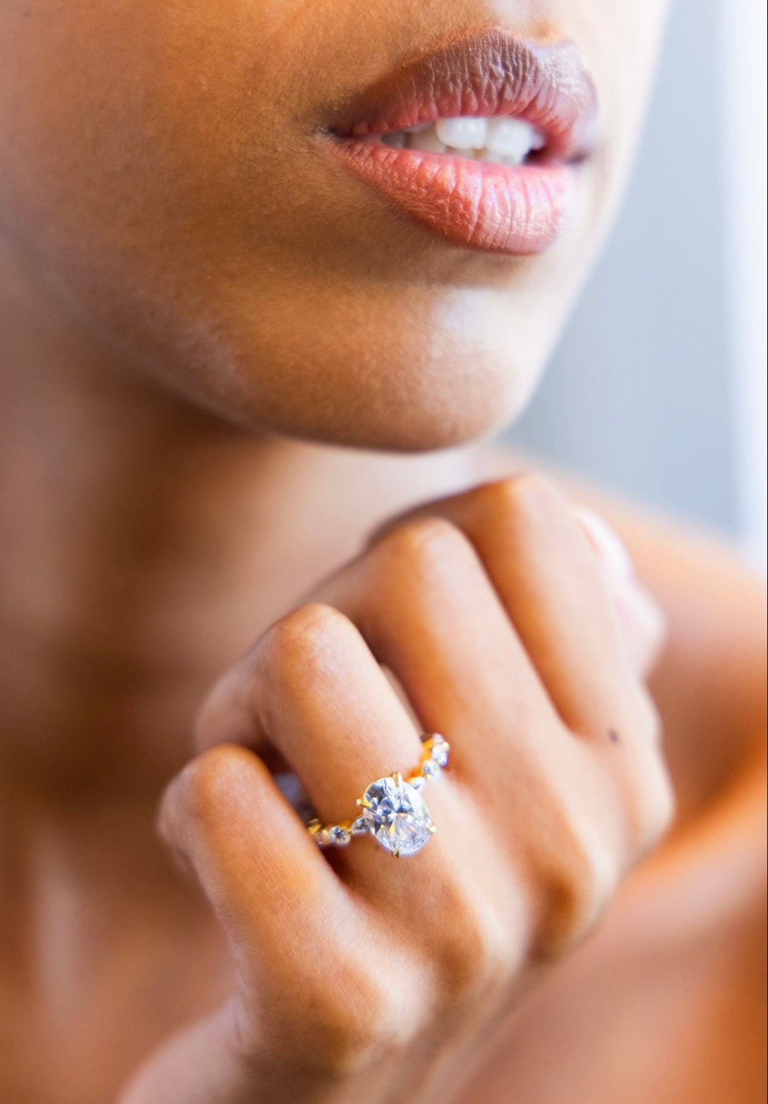 Marquise and Round Single Prong Diamond Engagement Ring with Oval Cut Diamond