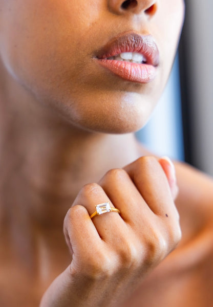 East West Engagement Ring with Emerald Cut Diamond