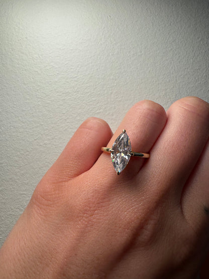 Hidden Halo Signature Solitaire Engagement Ring with Marquise Cut Diamond
