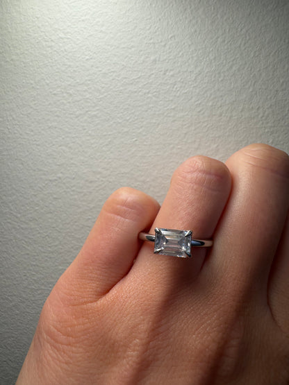 East West Engagement Ring with Emerald Cut Diamond