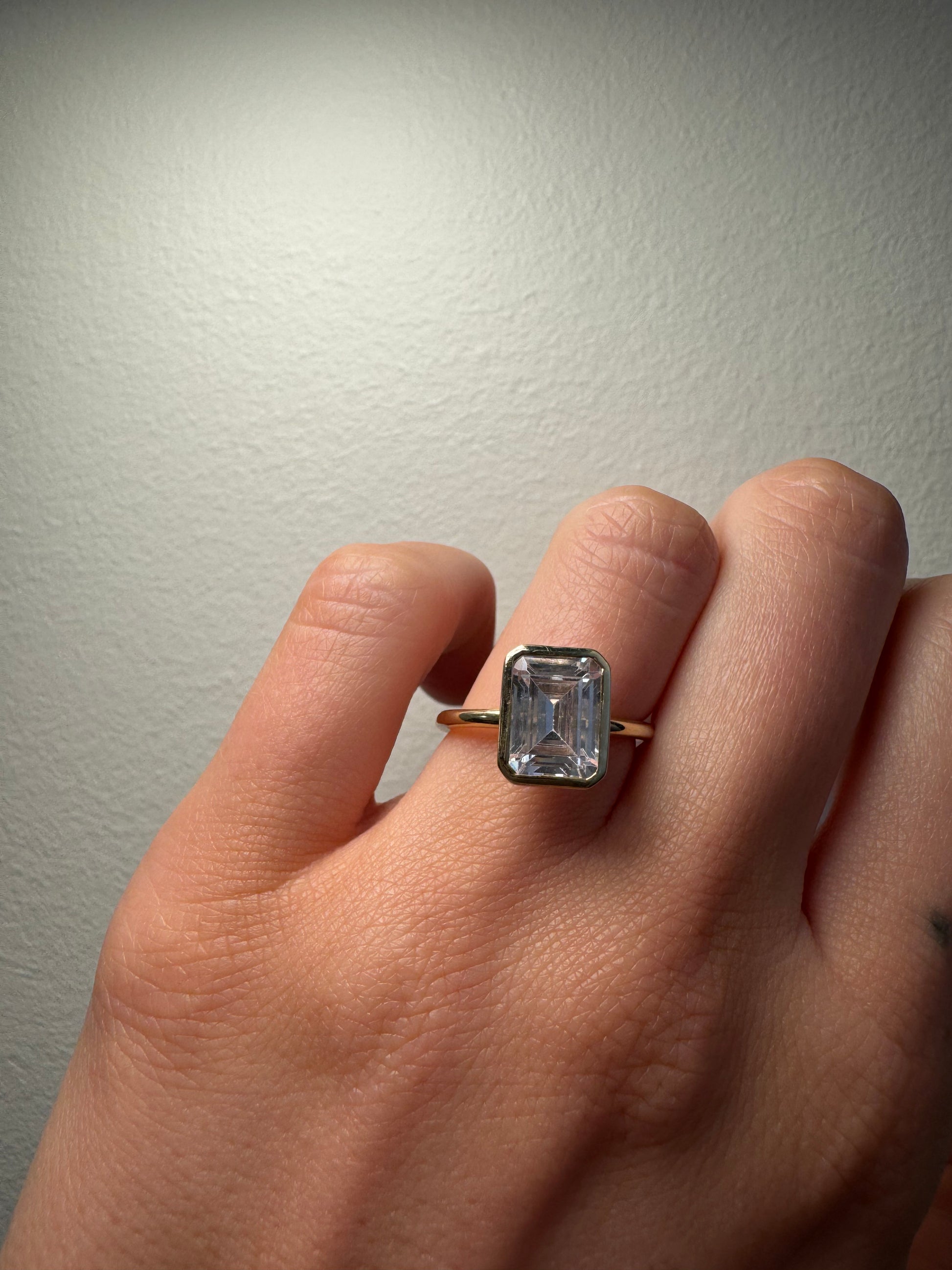 Bezel Set Engagement Ring with Emerald Cut Diamond