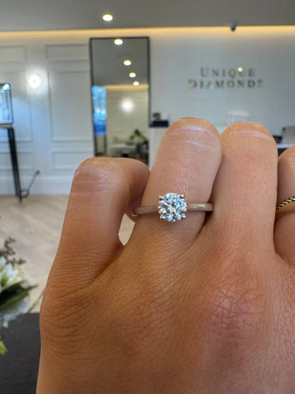 Cathedral Solitaire Engagement Ring with Round Brilliant Cut Diamond