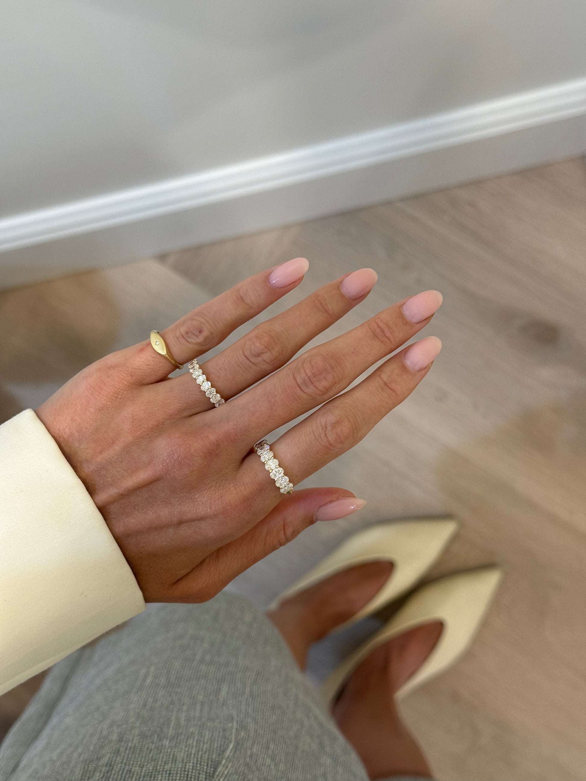 Shared Prong Band With Oval Cut Diamonds