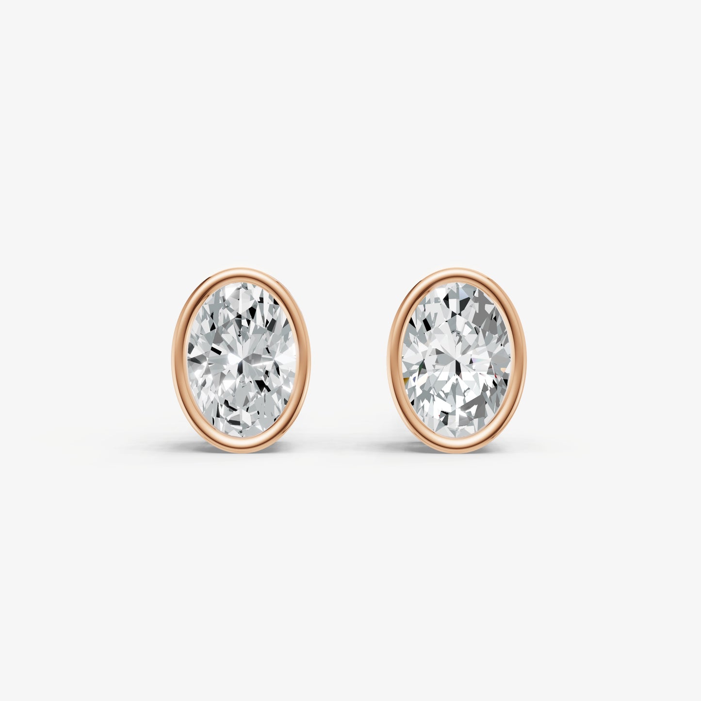1.00ct Total Diamond Weight Oval Bezel Set Diamond Stud Earrings