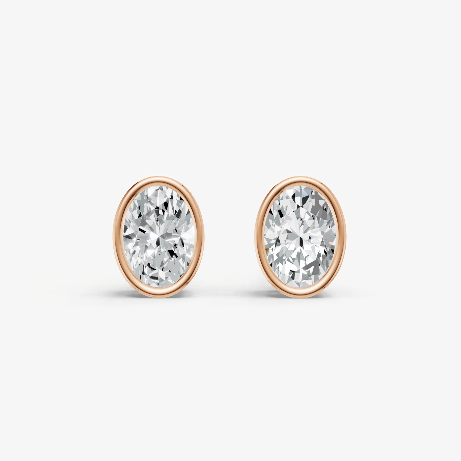 1.00ct Total Diamond Weight Oval Bezel Set Diamond Stud Earrings
