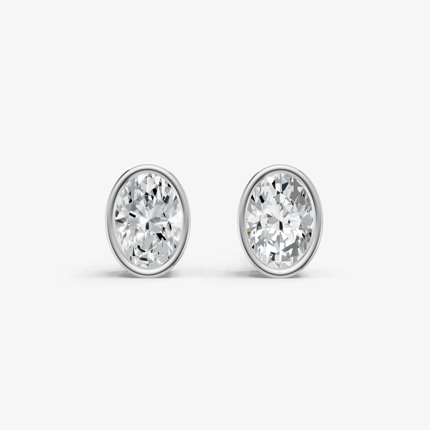 1.00ct Total Diamond Weight Oval Bezel Set Diamond Stud Earrings