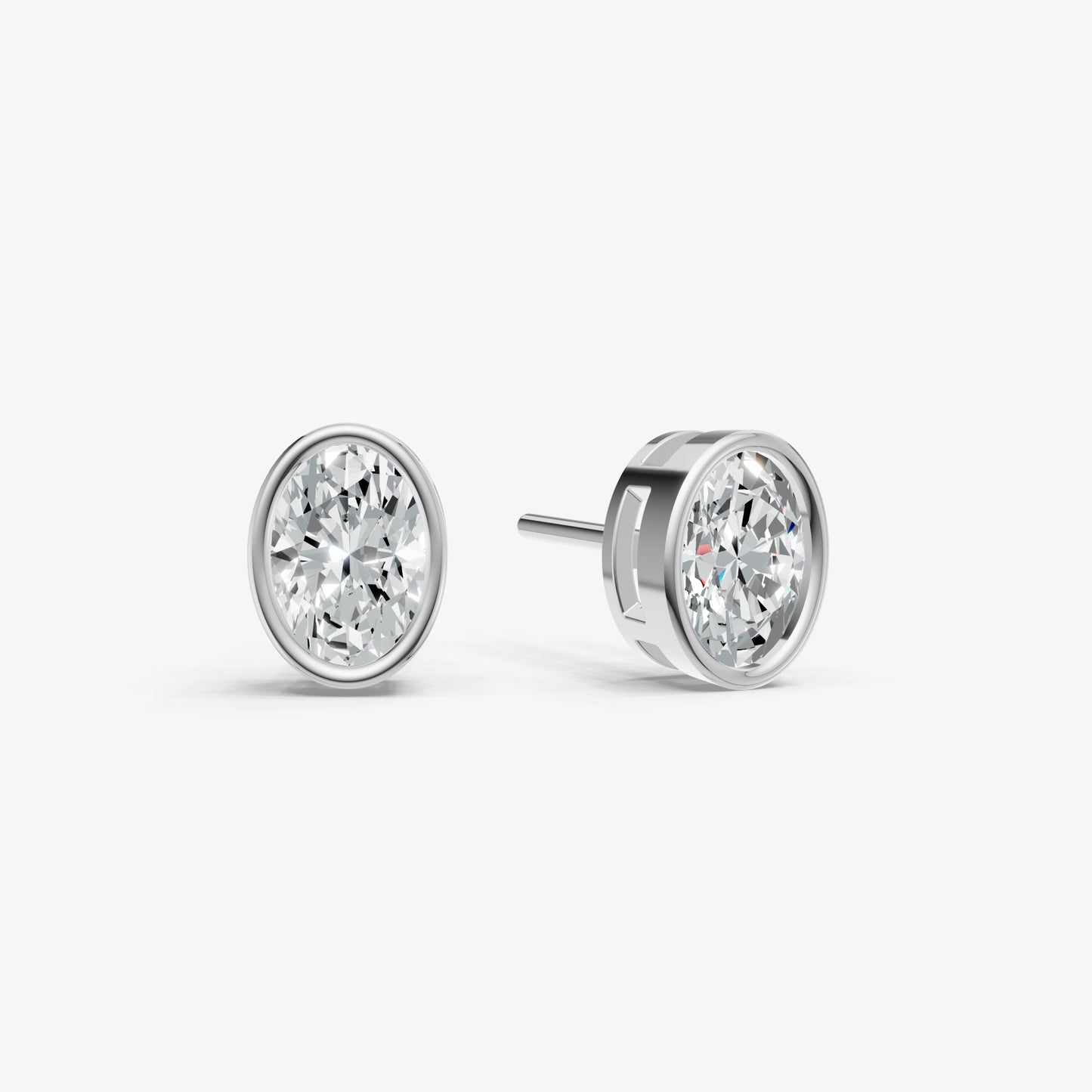1.00ct Total Diamond Weight Oval Bezel Set Diamond Stud Earrings