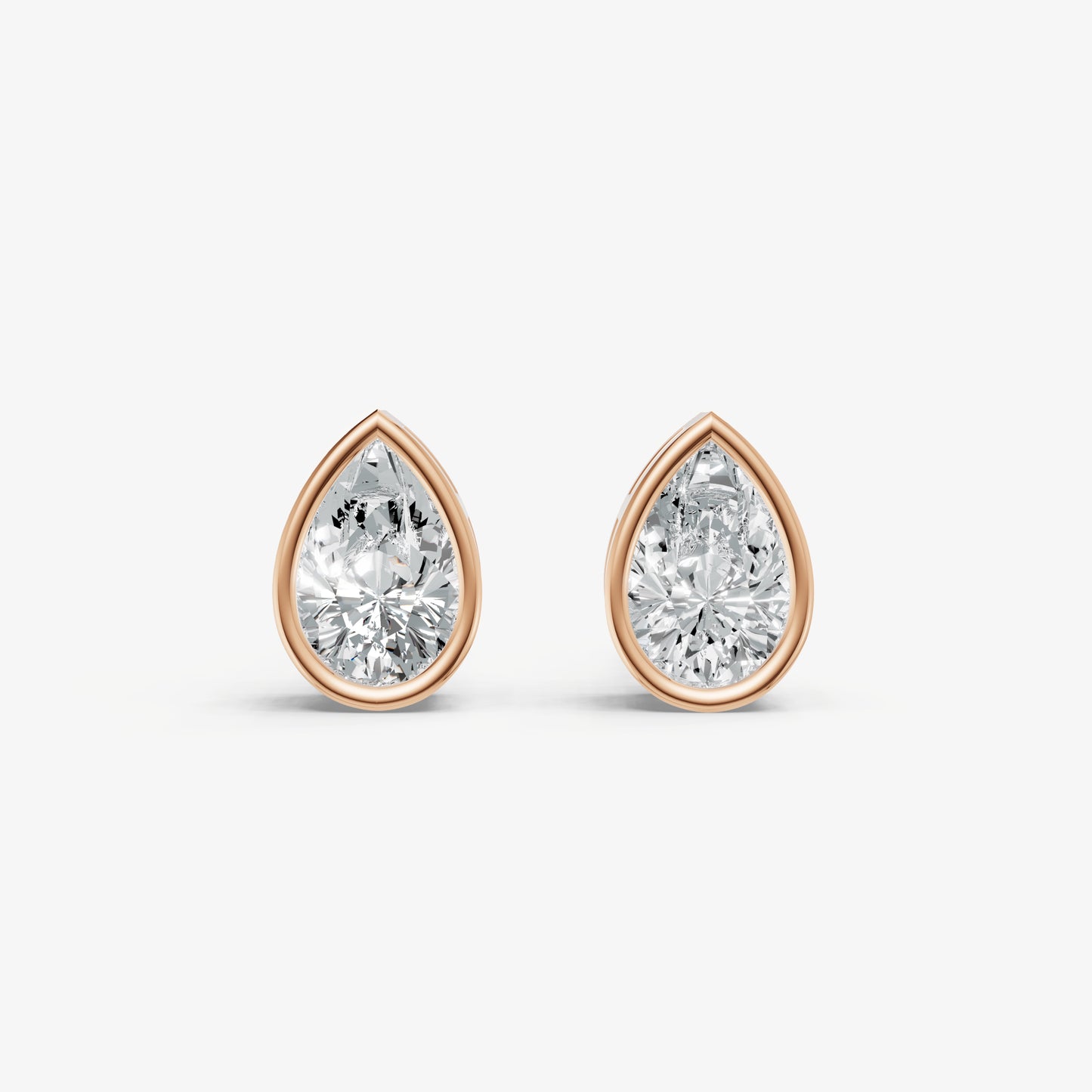 1.00ct Total Diamond Weight Pear Bezel Set Diamond Stud Earrings
