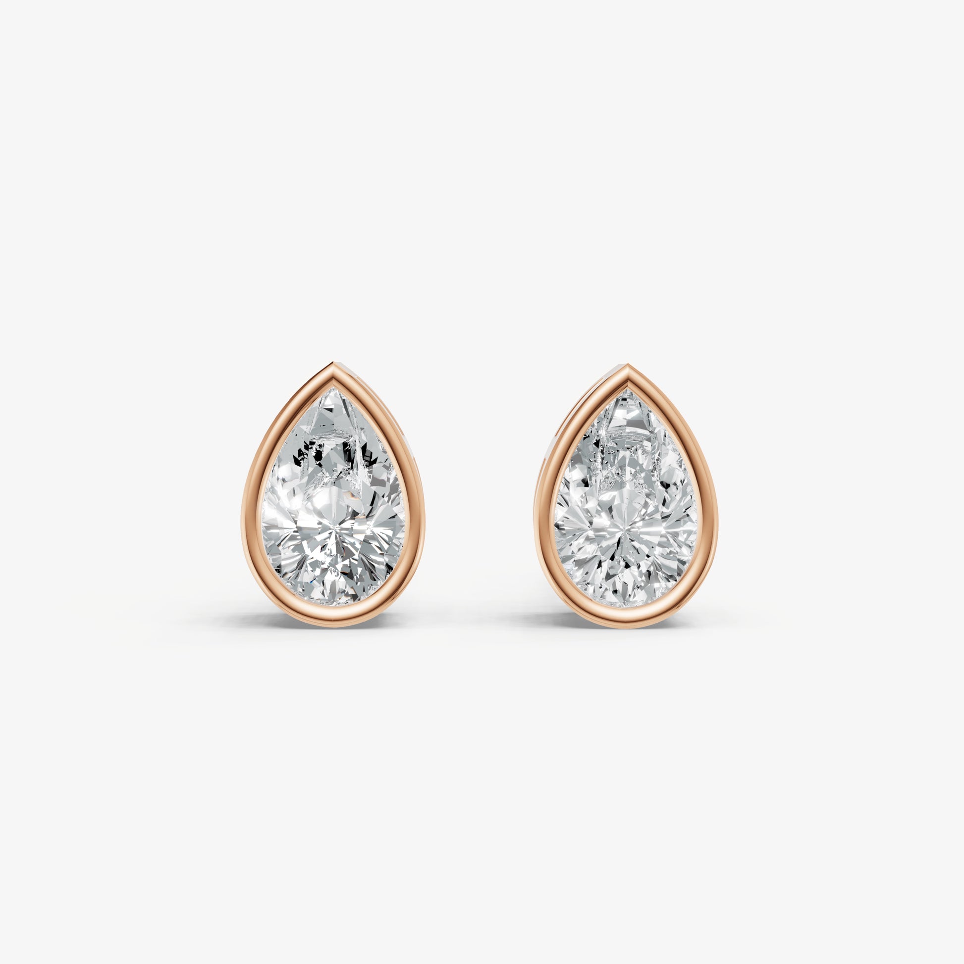 1.00ct Total Diamond Weight Pear Bezel Set Diamond Stud Earrings