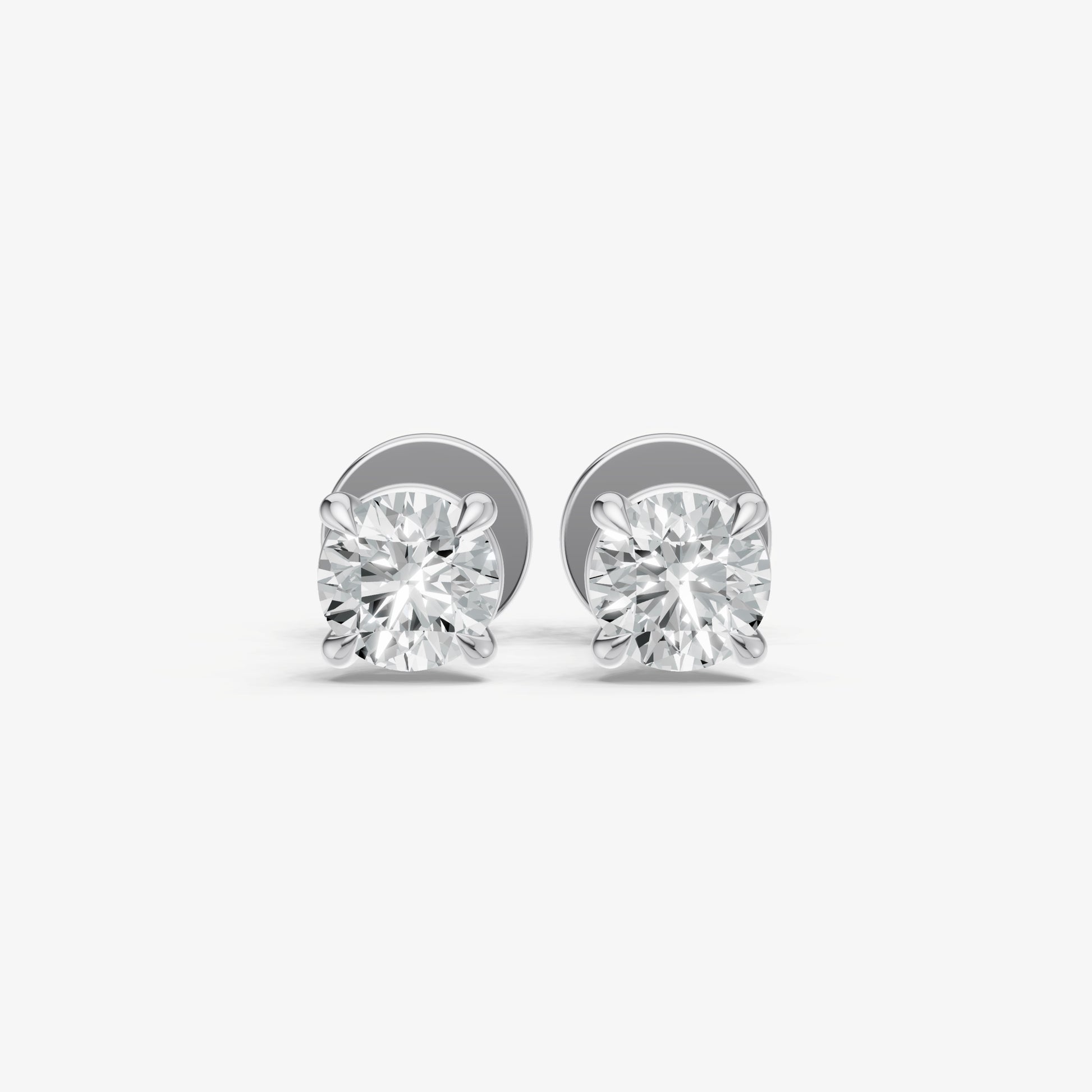 0.50ct Total Diamond Weight 4-Claw Diamond Stud Earrings