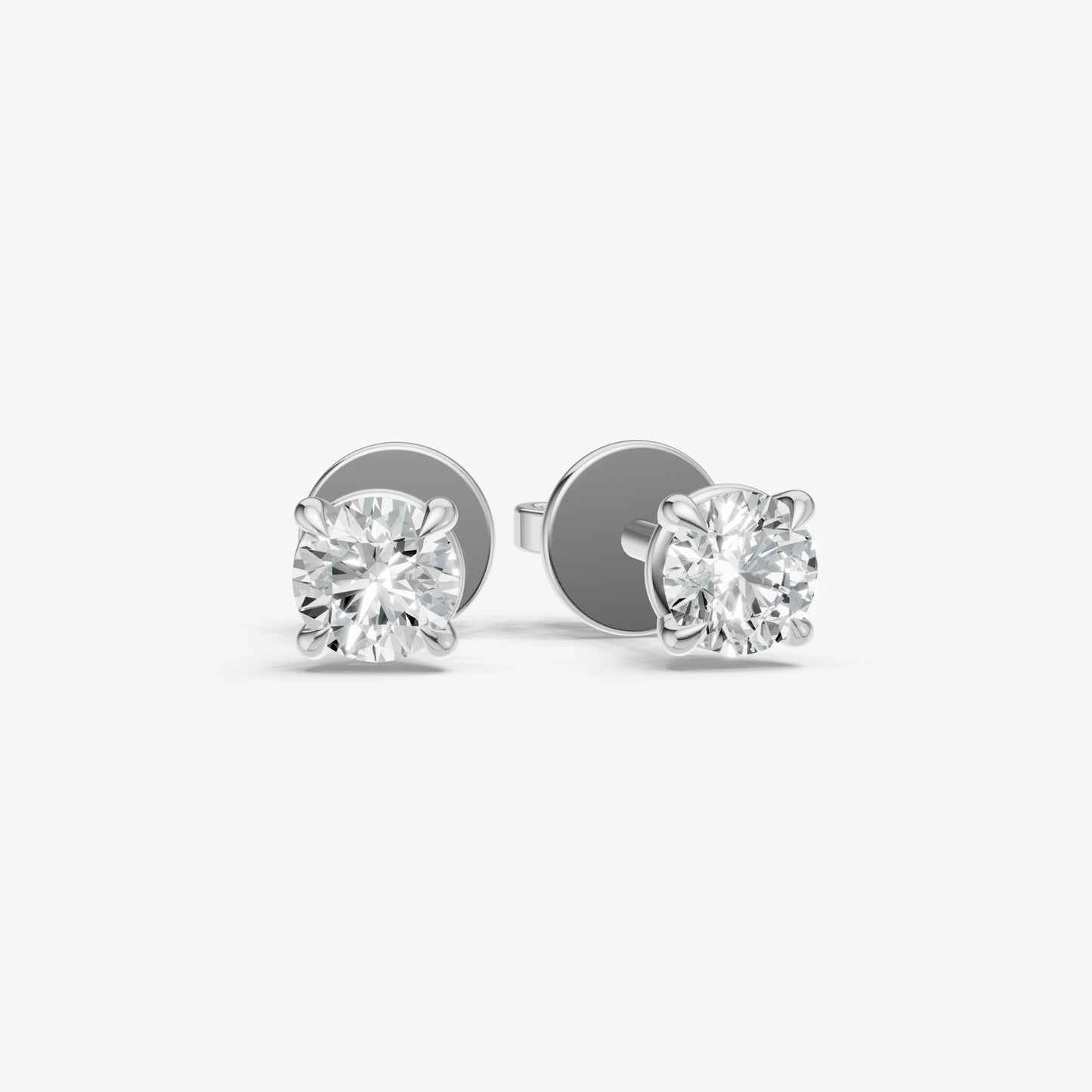 0.50ct Total Diamond Weight 4-Claw Diamond Stud Earrings