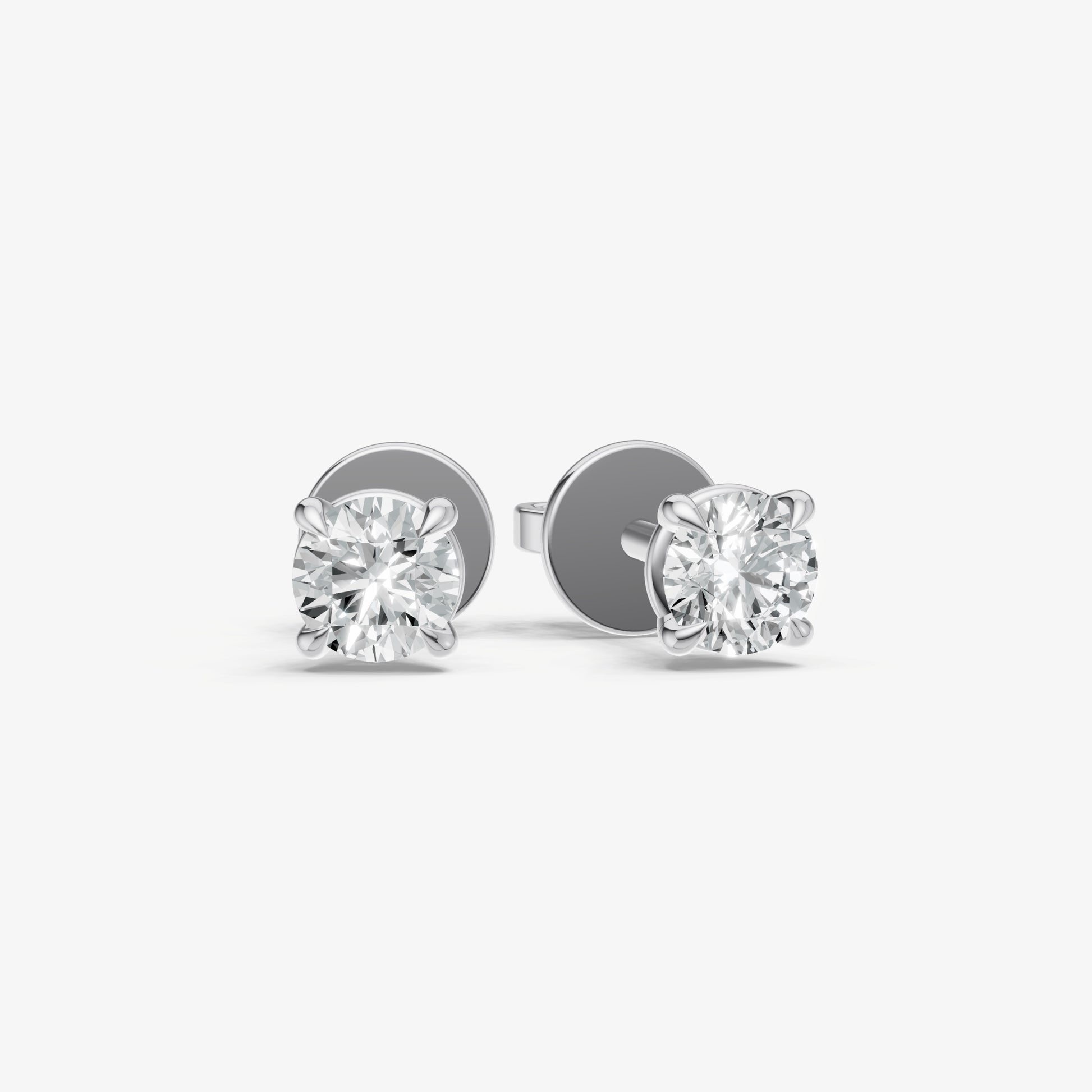 0.50ct Total Diamond Weight 4-Claw Diamond Stud Earrings