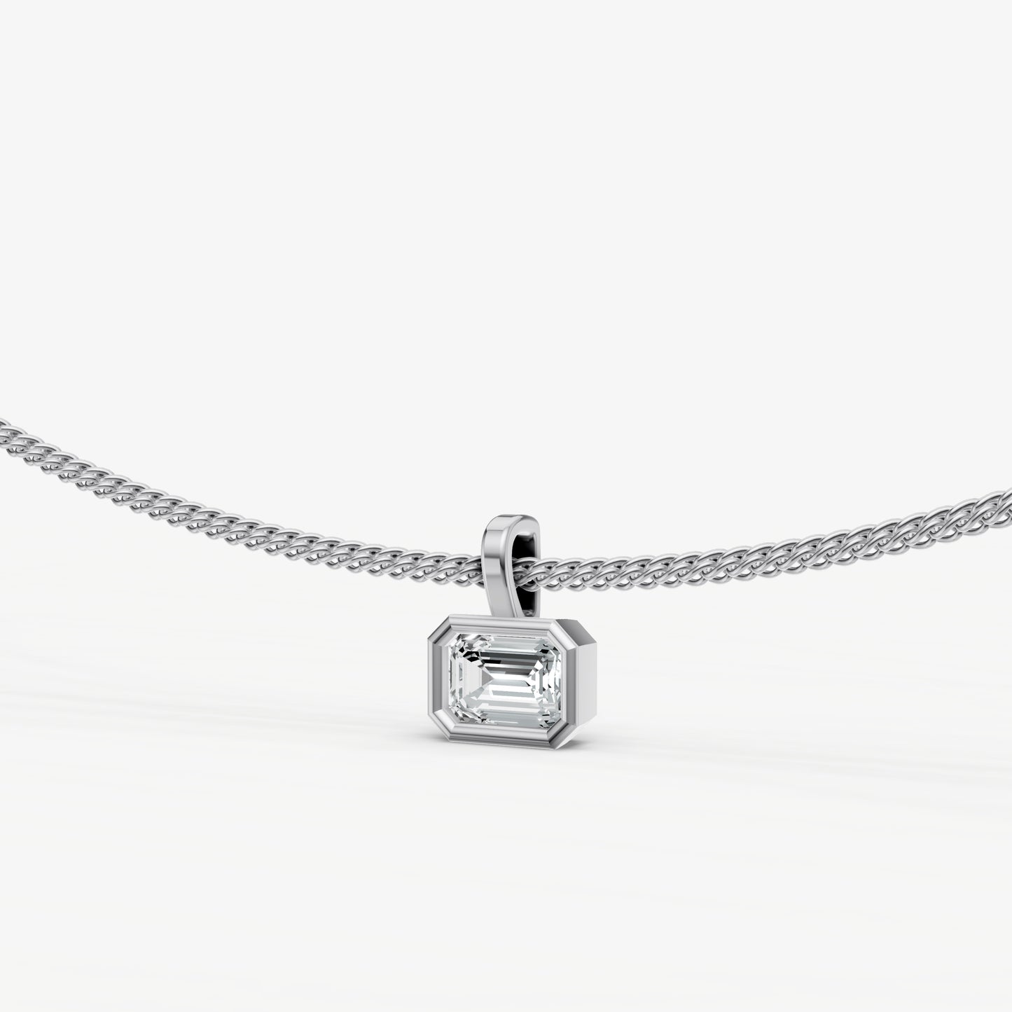 0.50ct Emerald Bezel Set Diamond Pendant