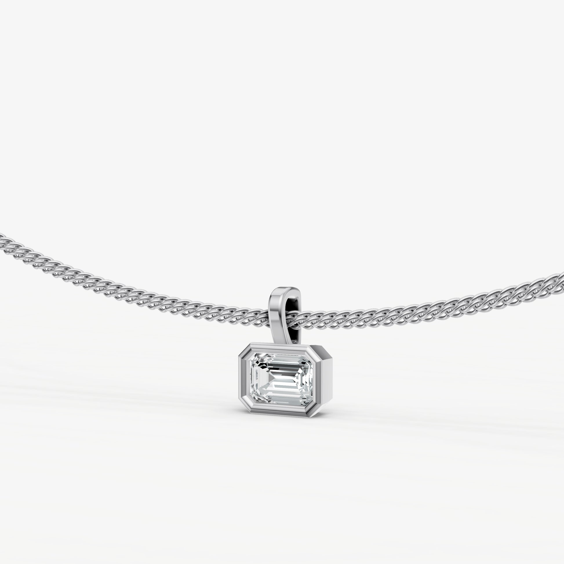 0.50ct Emerald Bezel Set Diamond Pendant