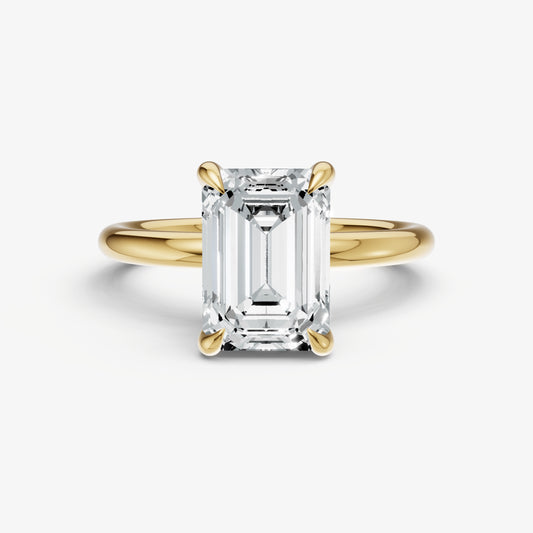 Emerald Four Claw Solitaire Engagement Ring