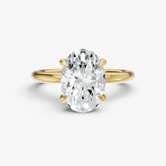 Oval Four Claw Solitaire Engagement Ring