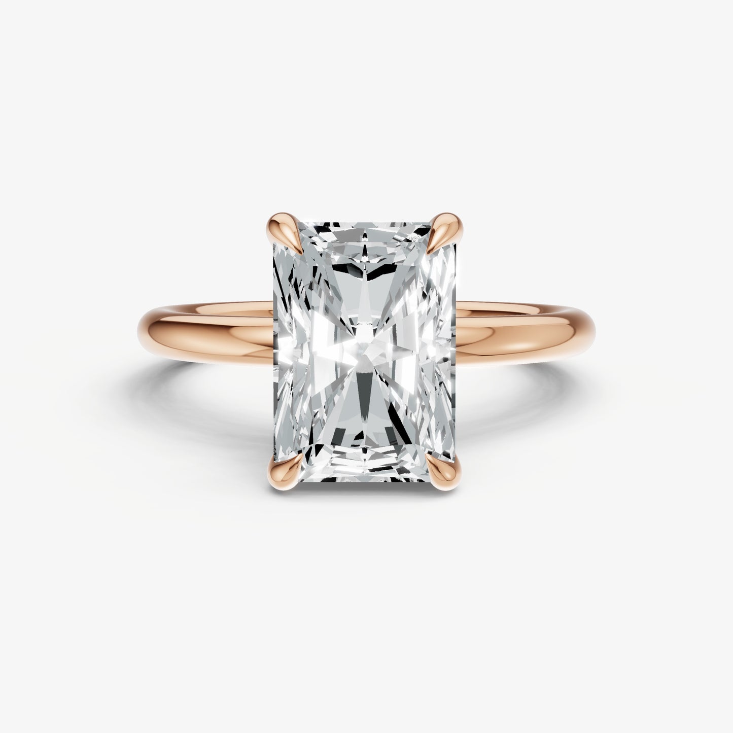Radiant Four Claw Solitaire Engagement Ring