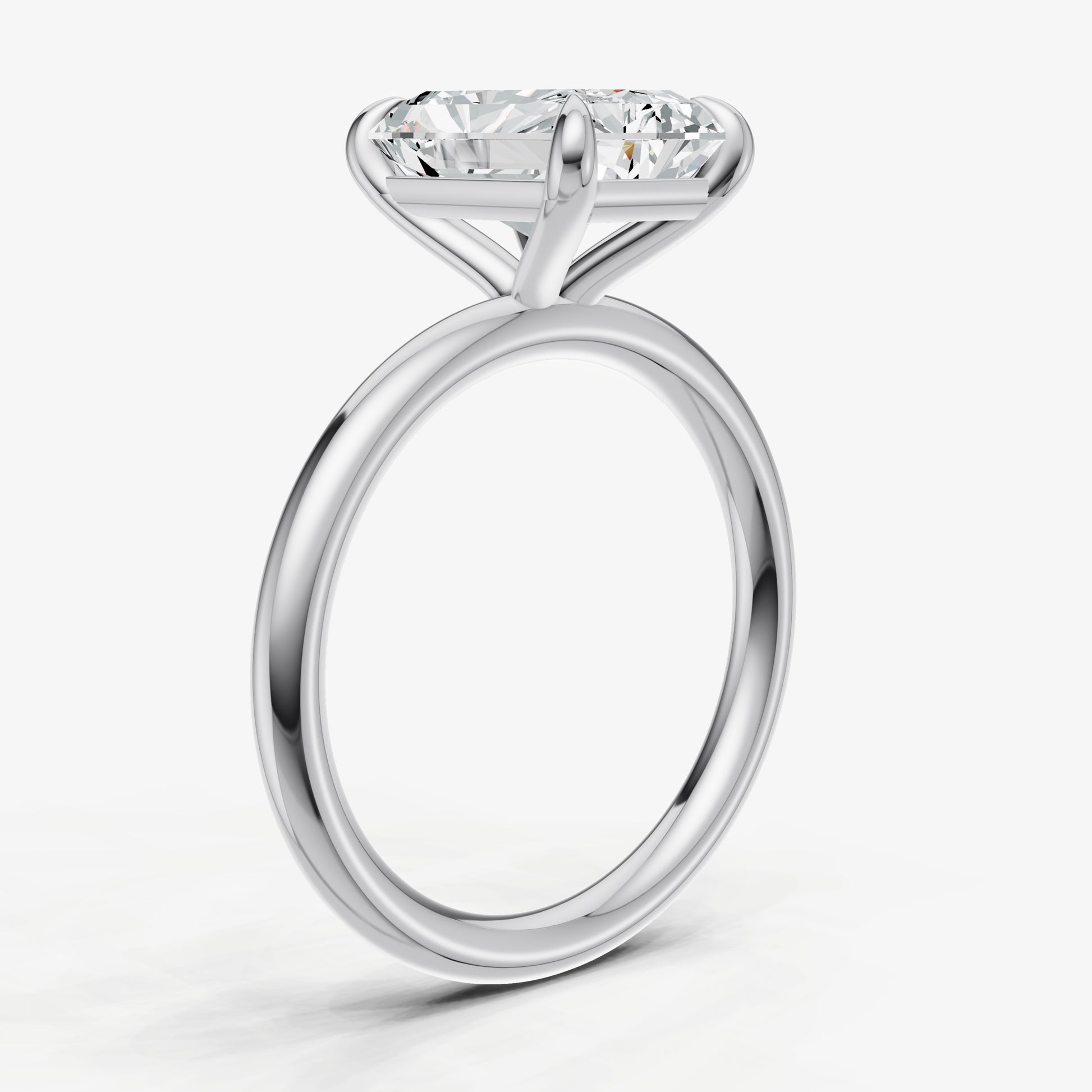 Radiant Four Claw Solitaire Engagement Ring