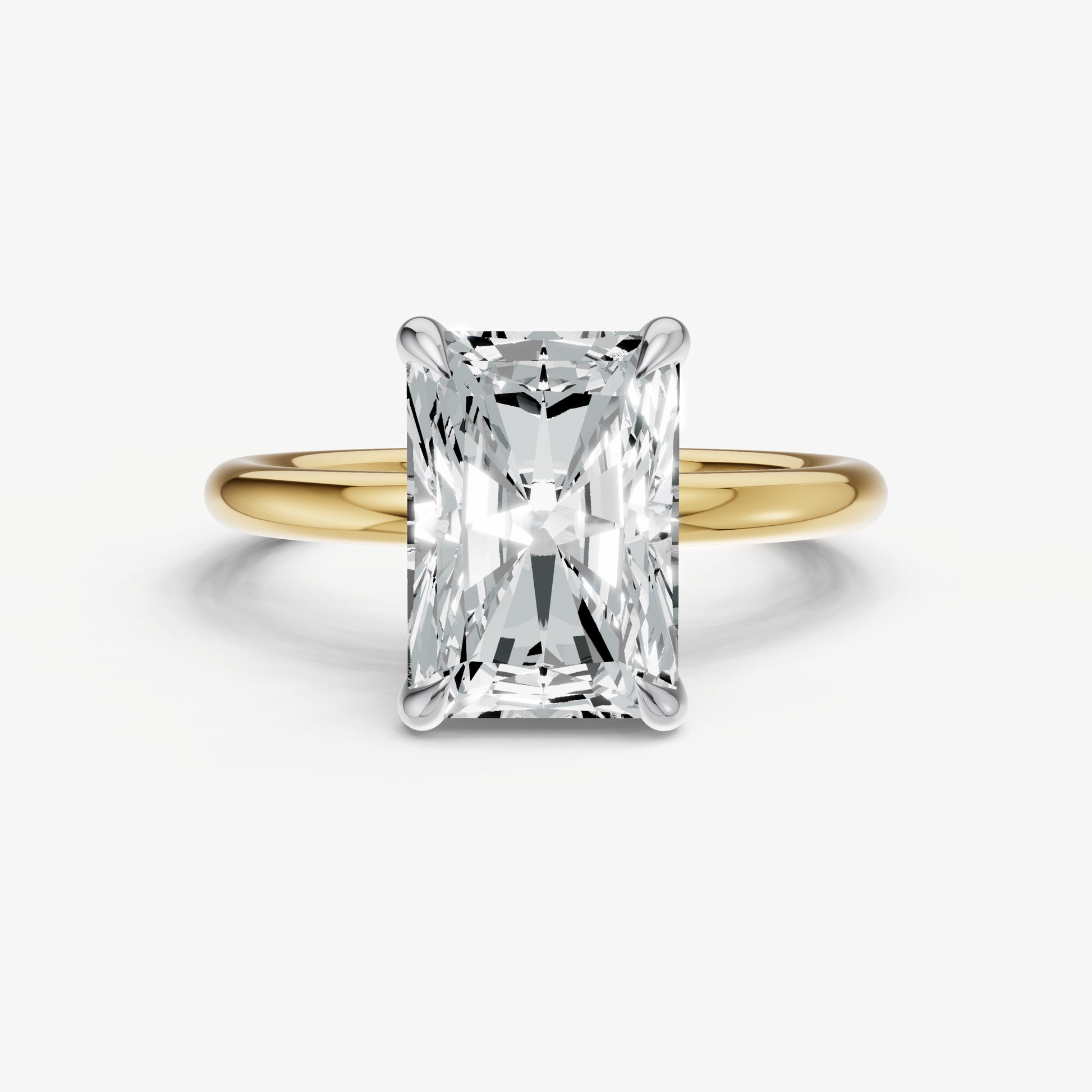Radiant Four Claw Solitaire Engagement Ring
