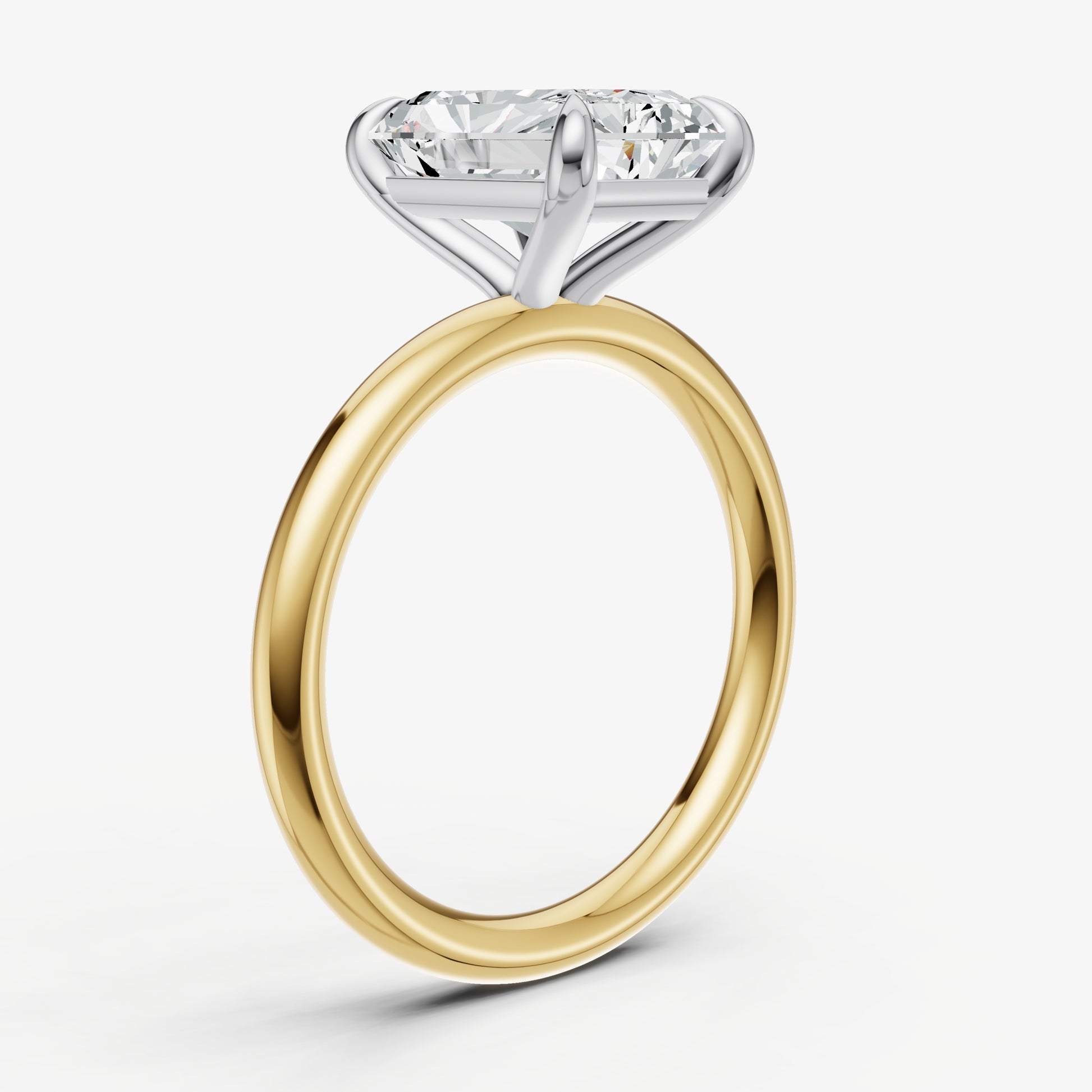 Radiant Four Claw Solitaire Engagement Ring
