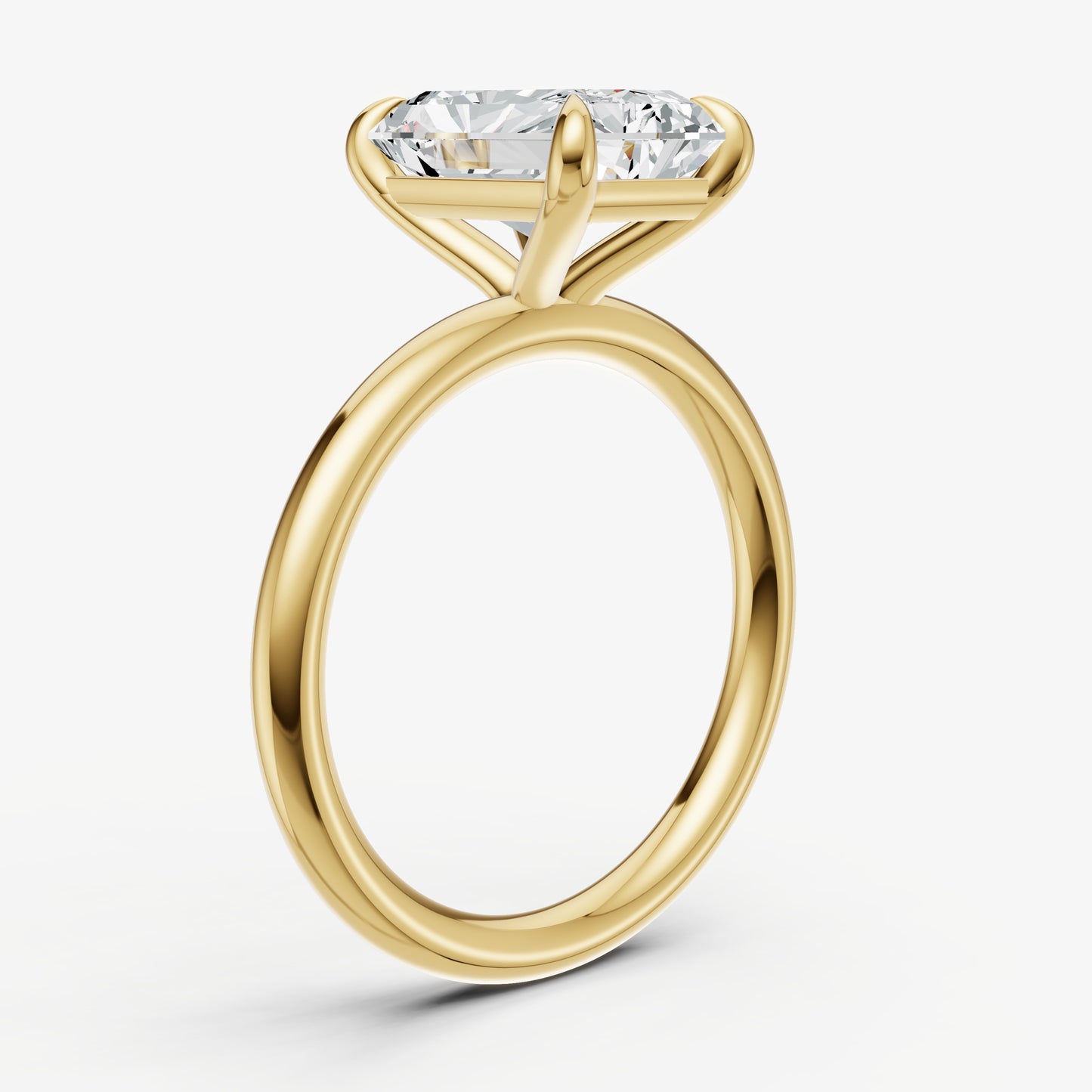 Radiant Four Claw Solitaire Engagement Ring