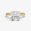 Round Four Claw Solitaire Engagement Ring