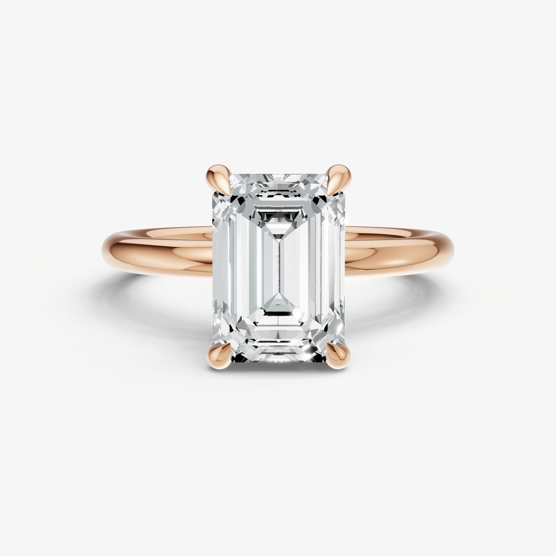Emerald Four Claw Solitaire Engagement Ring with Hidden Halo