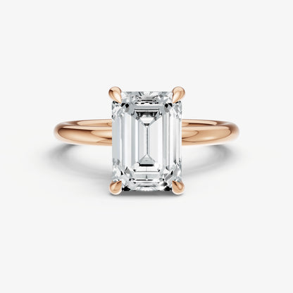 Emerald Four Claw Solitaire Engagement Ring with Hidden Halo
