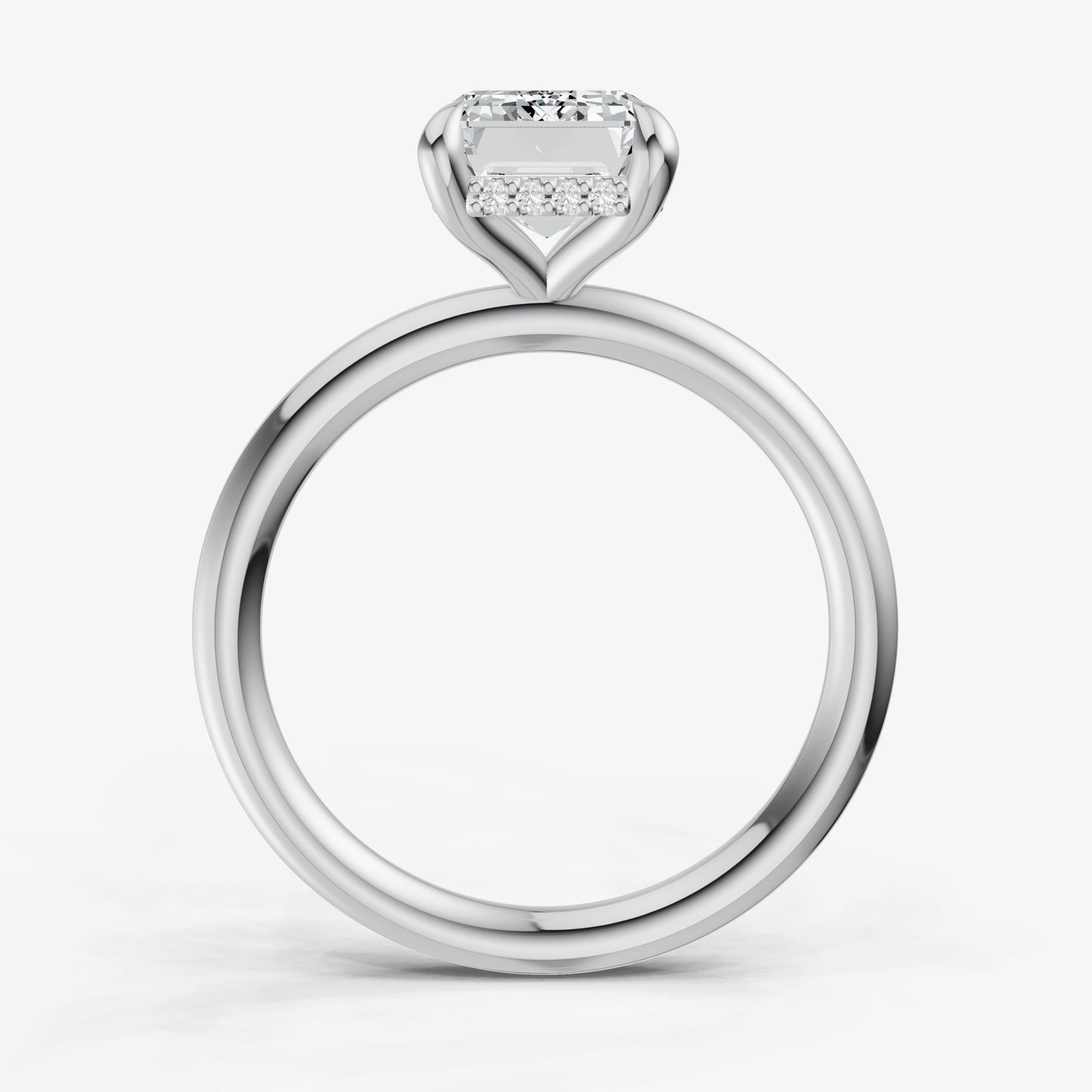 Emerald Four Claw Solitaire Engagement Ring with Hidden Halo
