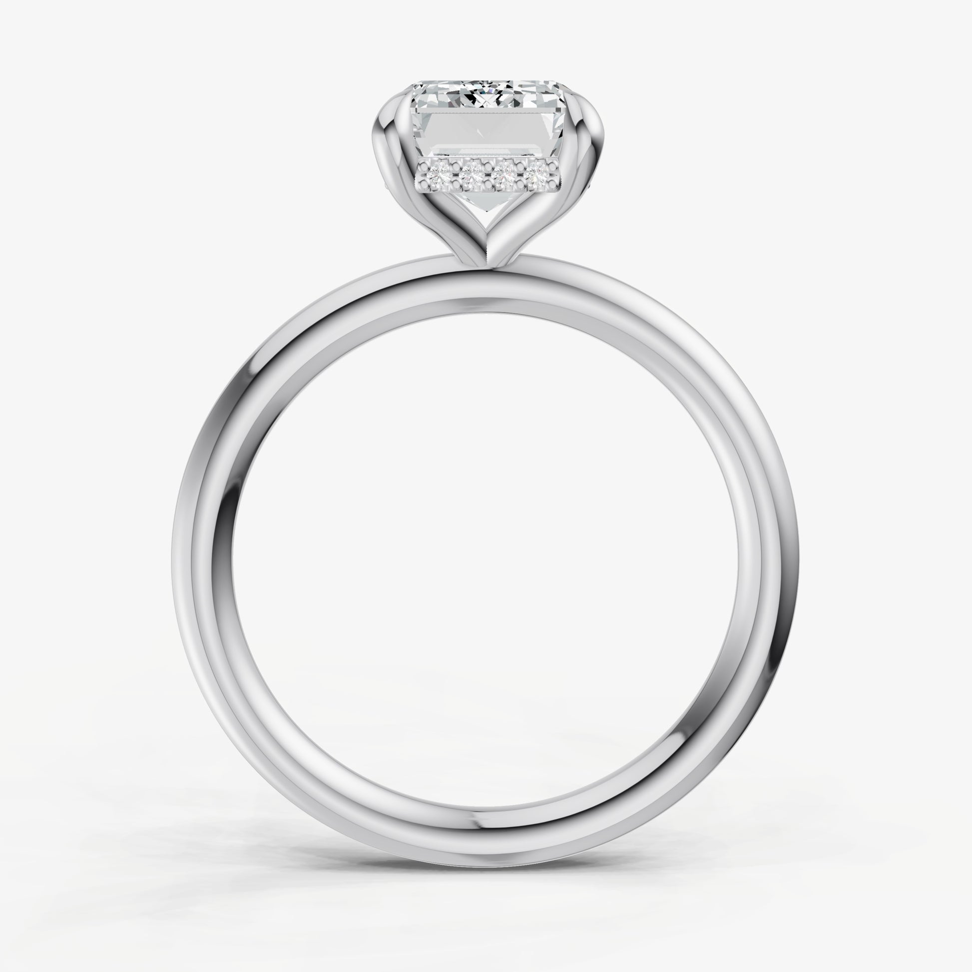 Emerald Four Claw Solitaire Engagement Ring with Hidden Halo