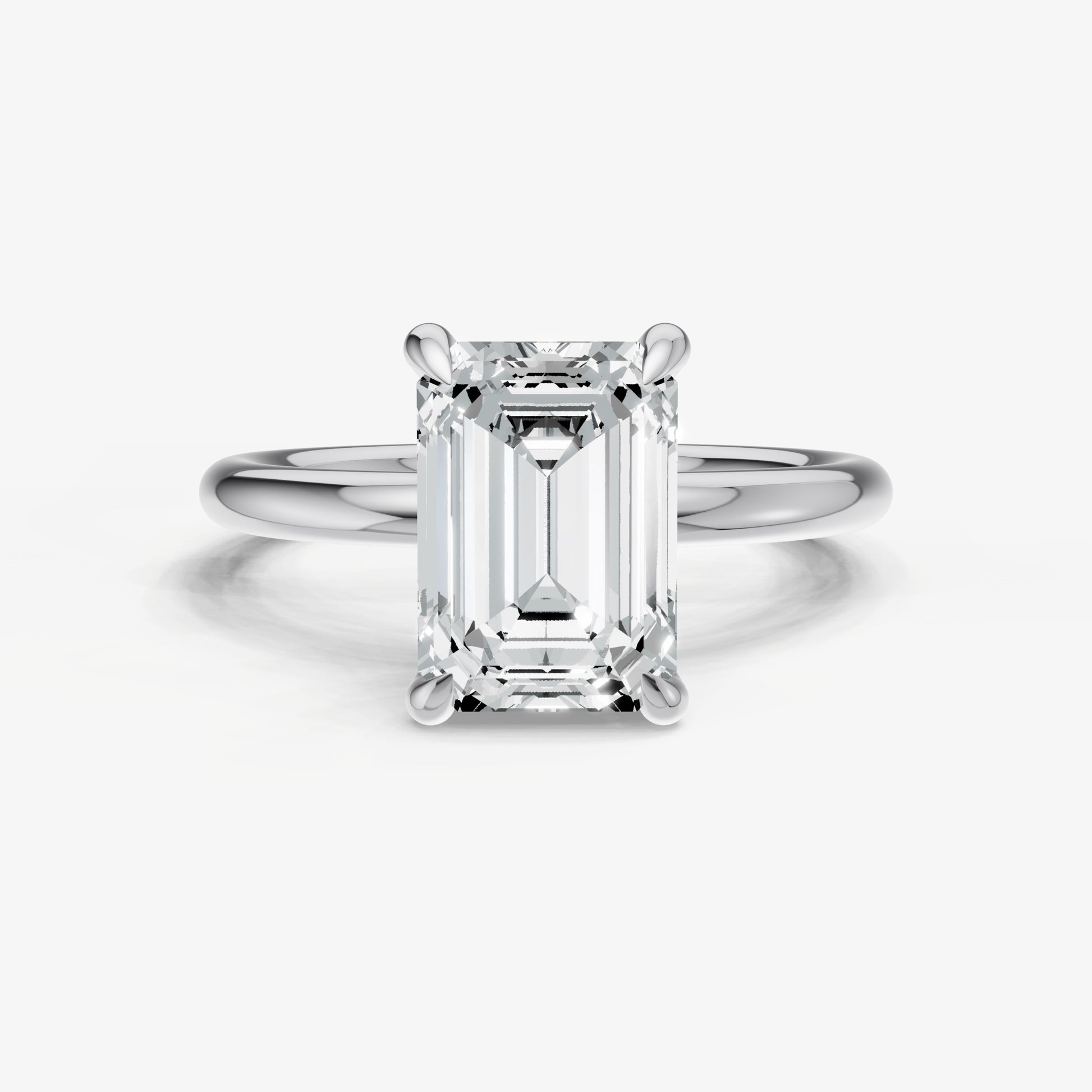 Emerald Four Claw Solitaire Engagement Ring with Hidden Halo