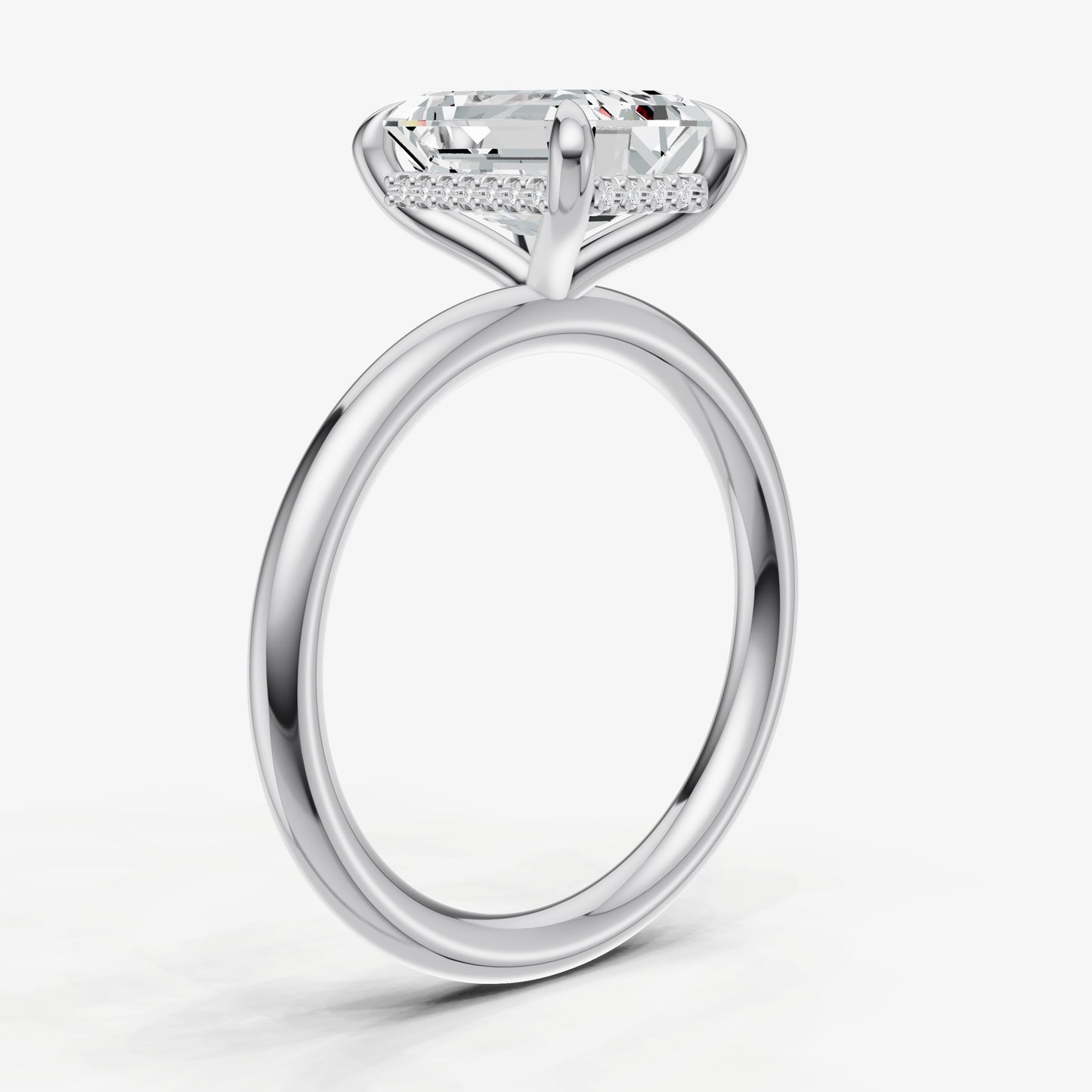 Emerald Four Claw Solitaire Engagement Ring with Hidden Halo