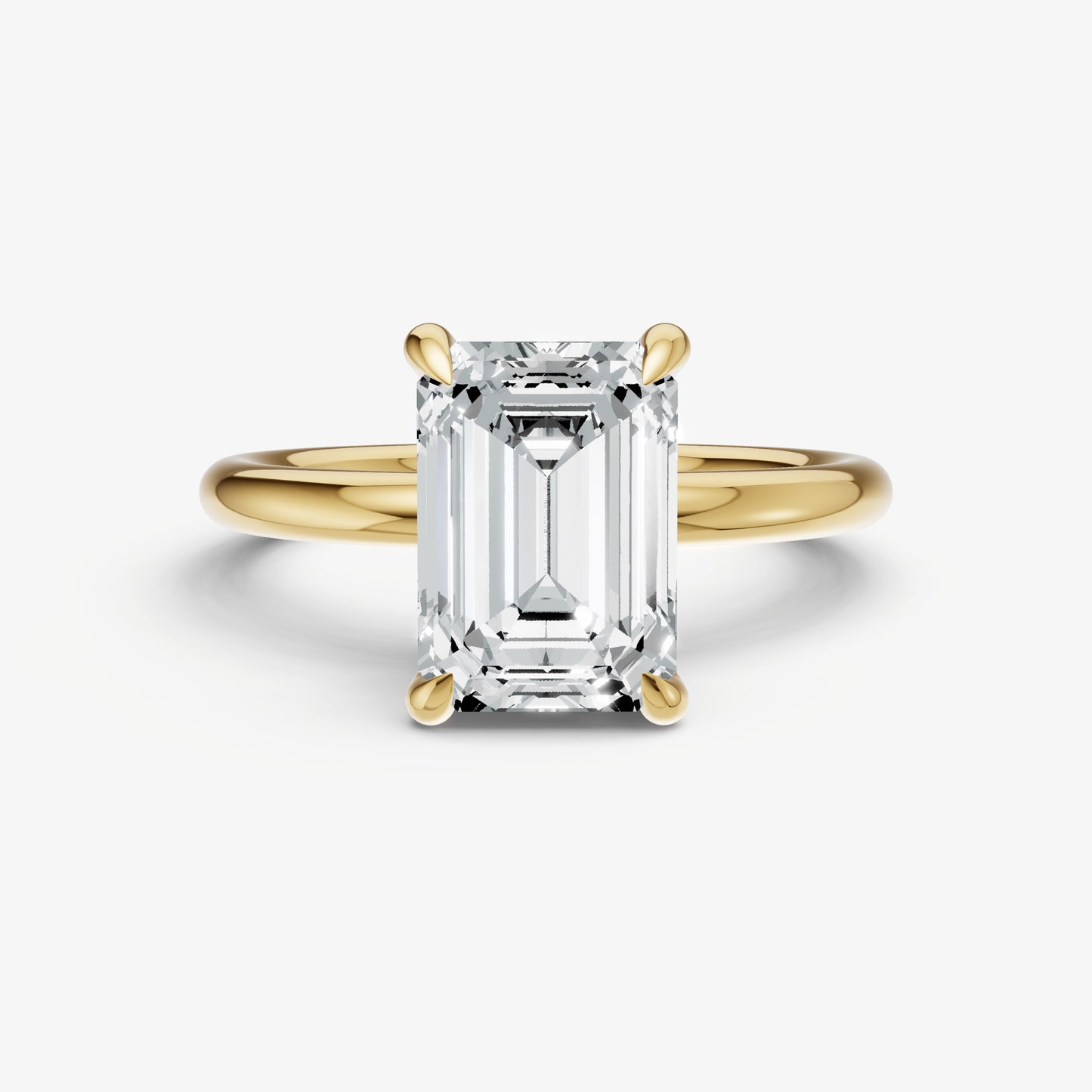 Emerald Four Claw Solitaire Engagement Ring with Hidden Halo