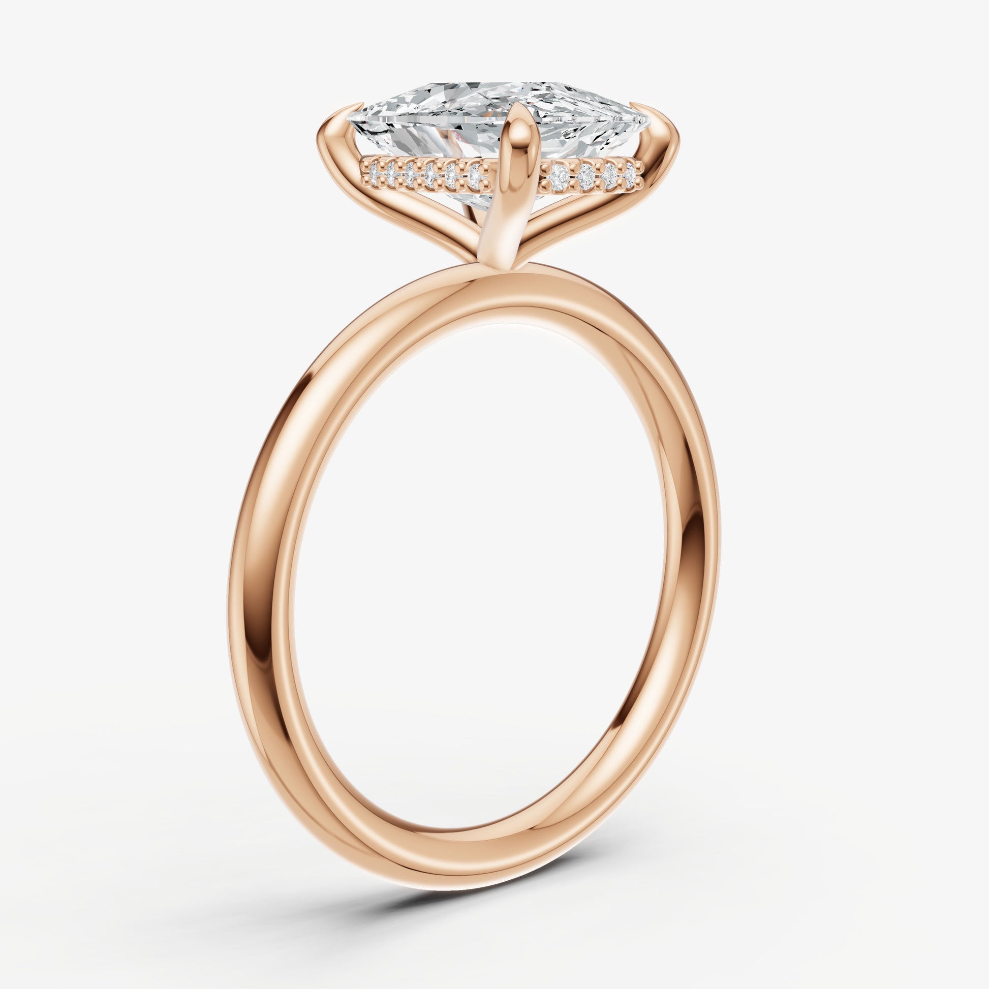 Elongated Cushion Four Claw Solitaire Engagement Ring with Hidden Halo